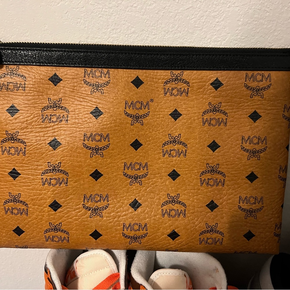 MCM Tan and Black Logo Clutch